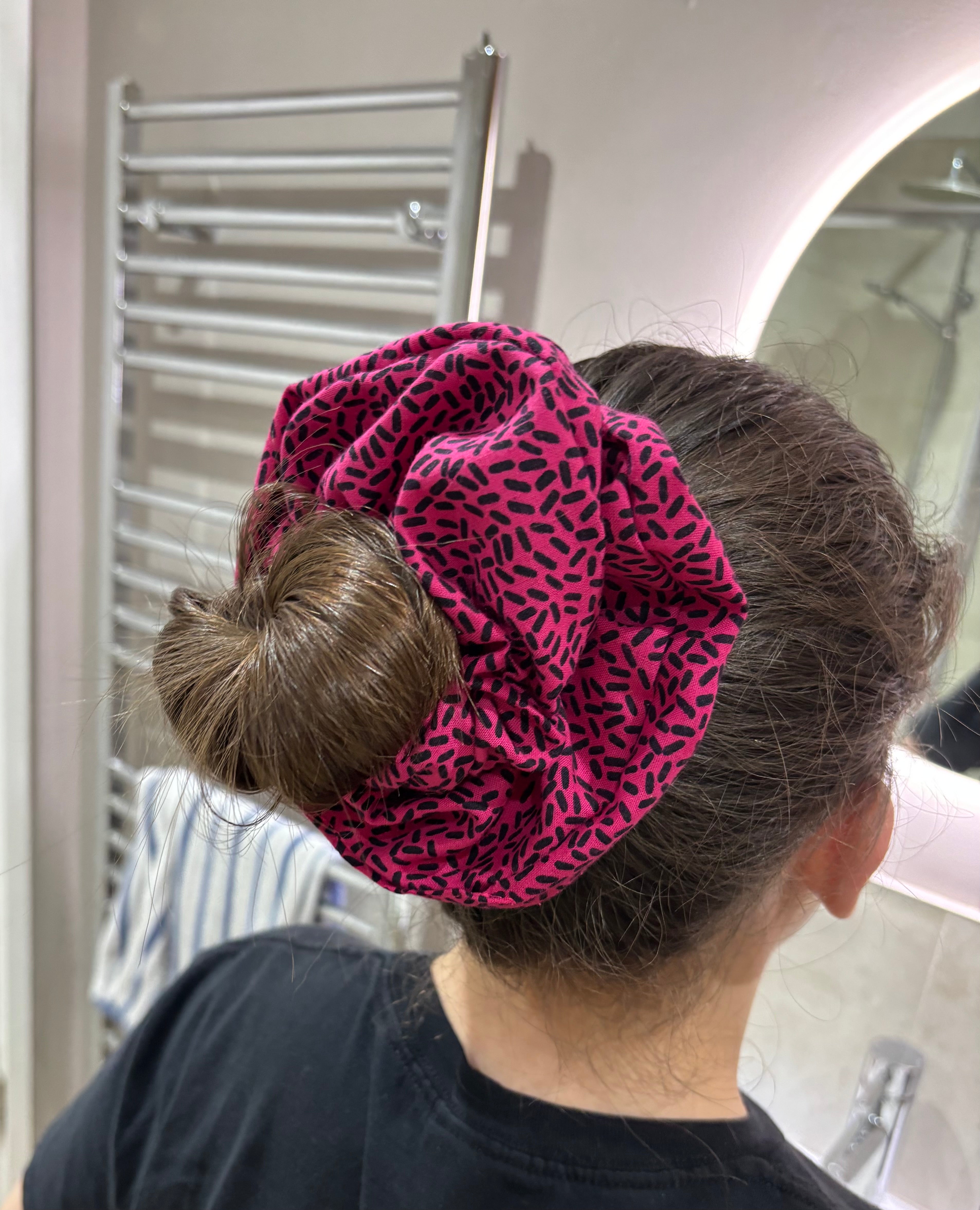 The Pink Confetti Jumbo Scrunchie: Highlights the speckled pattern.