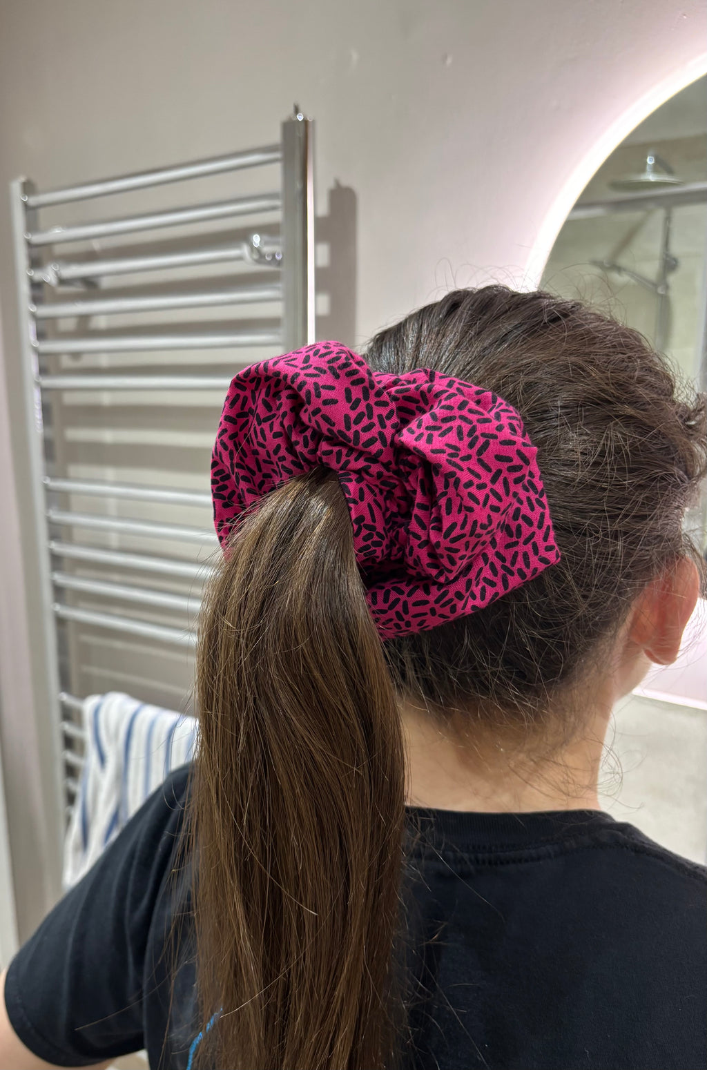 The Pink Confetti Jumbo Scrunchie: Highlights the speckled pattern.