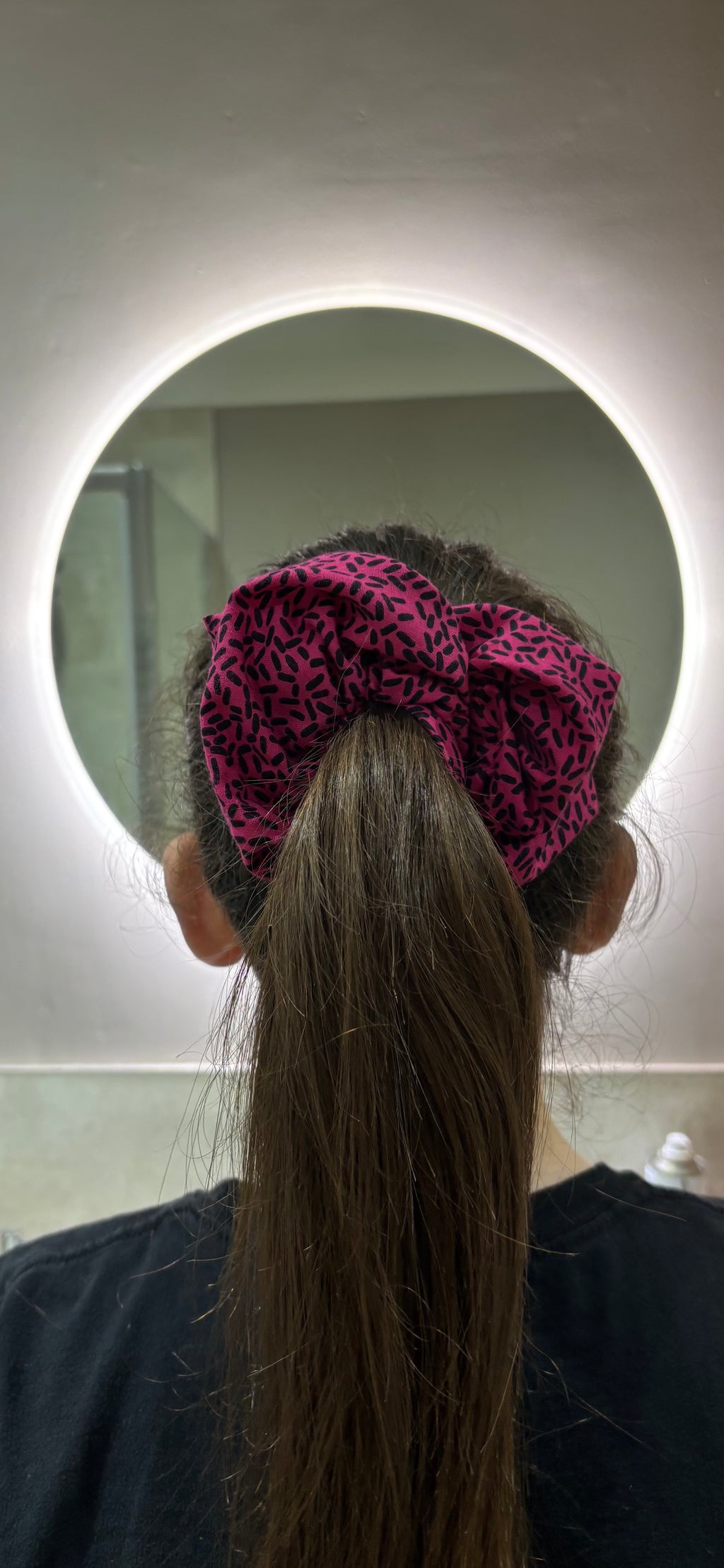 The Pink Confetti Jumbo Scrunchie: Highlights the speckled pattern.